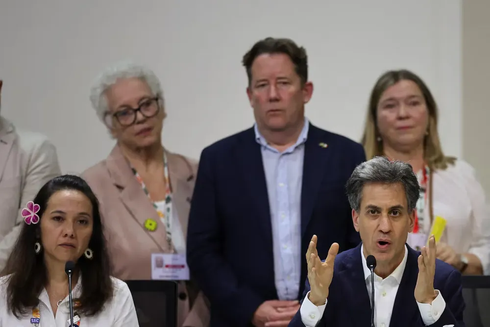 britains-secretary-of-state-for-energy-security-and-net-zero-ed-miliband-speaks-next-tina-stege-marshall-islands-climate-envoy-during-a-joint-statement-during-the-un-climate-change-conference-cop30-in