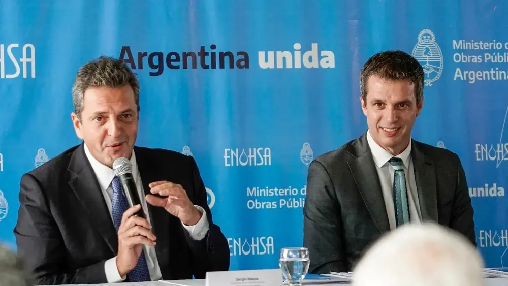 Massa y Enrique Cresto